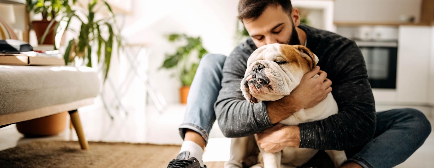 a person holding a dog