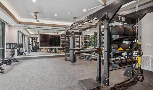 Cardio + strength equipment inside Copper Bishop Arts' fitness center